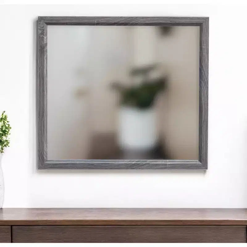 Miroir décoratif encadré de bois gris foncé