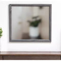 Miroir décoratif encadré de bois gris foncé