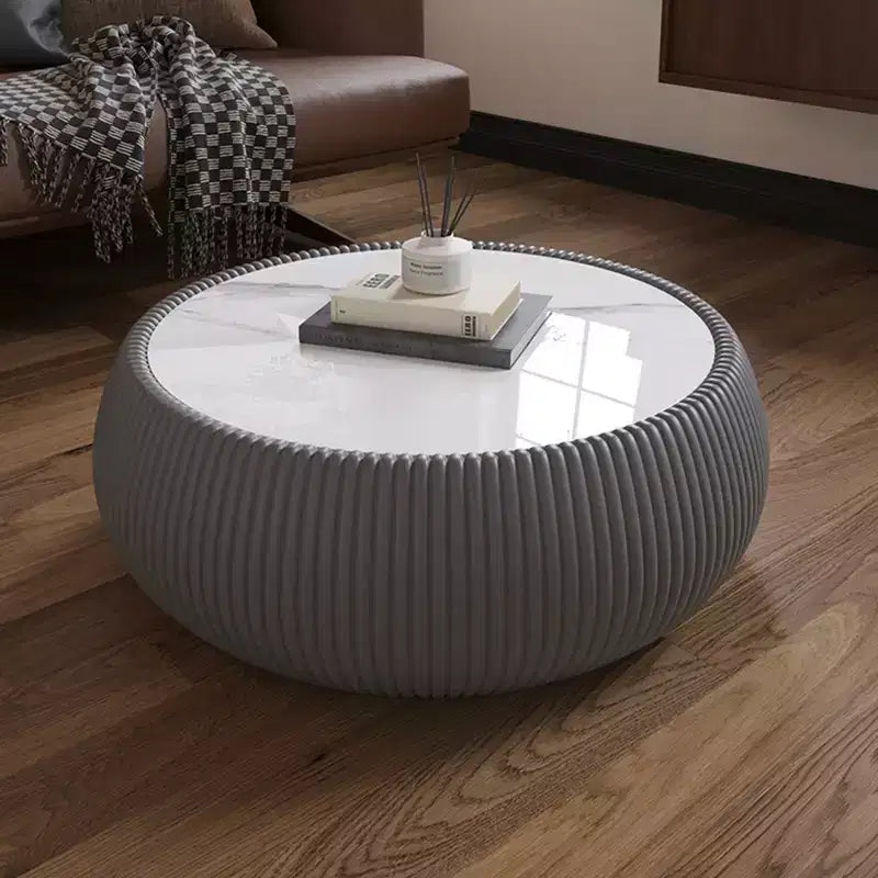 Table basse en cuir en forme de tambour avec plateau en pierre frittée et motif gris