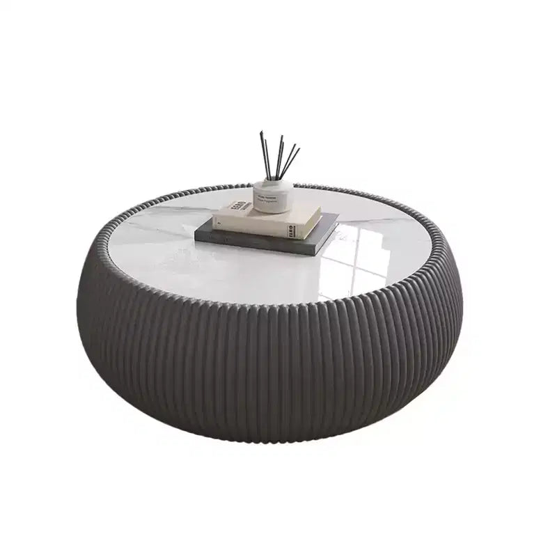 Table basse en cuir en forme de tambour avec plateau en pierre frittée et motif gris